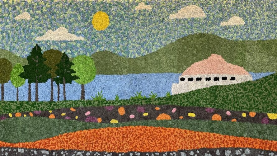 Moss wall depicting an idealized view from Berkeley Lab of the San Francisco Bay and mountains beyond with grasses and trees and layers of subsurface soil, microbes, and rocks.